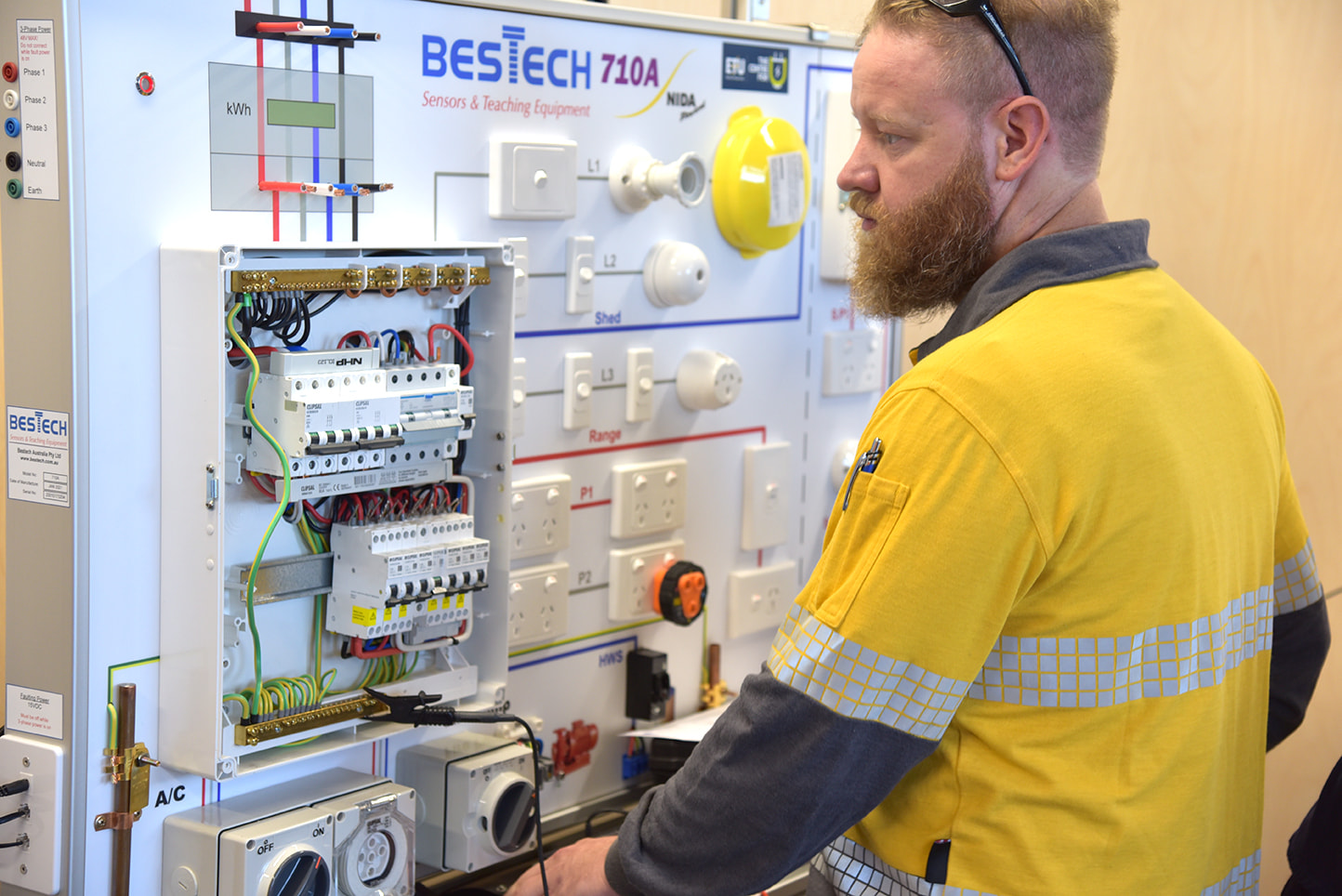 Electrical Trades Union of Victoria member working on Continued Professional Development (CPD) board at ETU headquarters in North Melbourne, Victoria Electrical Trades Union of Victoria member working on Continued Professional Development (CPD) board at ETU headquarters in North Melbourne, Victoria